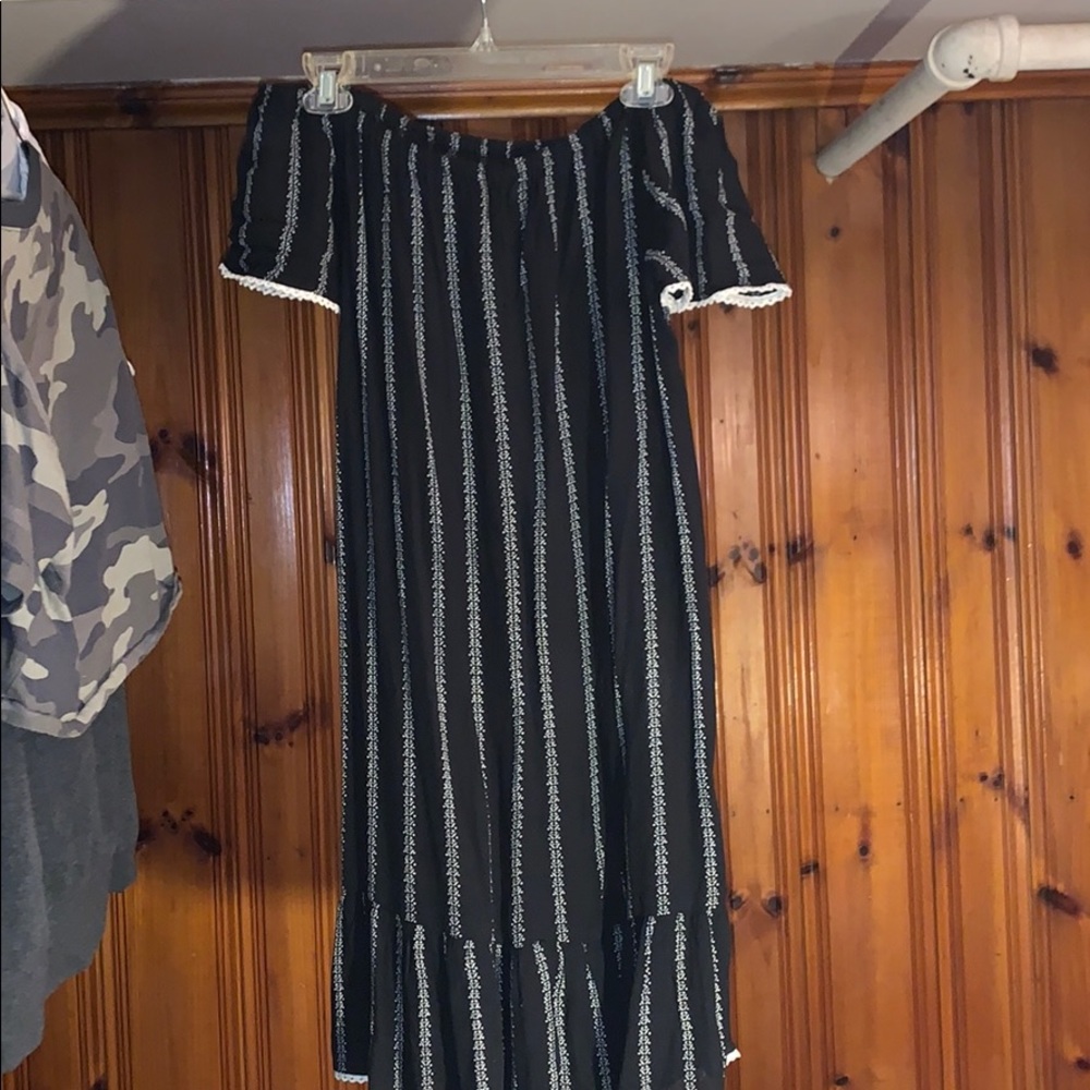 Black off the shoulder dress from Prague